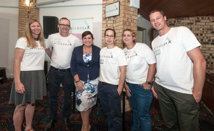 Minister for Innovation, Science and the Digital Economy and Minister for Small Business Leeanne Enoch with team members from Microba 